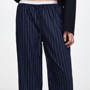 Boxer-style formal pants with pinstripe fabric